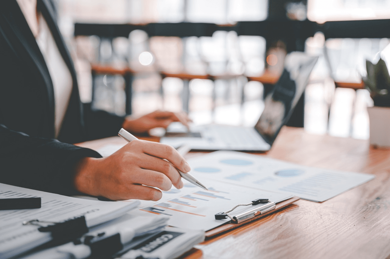 Reviewing financial reports and charts